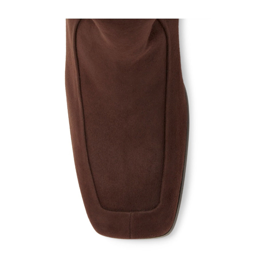 Neil J Rodgers Laura 90s knee boot with a rounded square toe, fitted leg that hits just below the knee, and comfortable block heel made from chocolate brown Italian suede.
