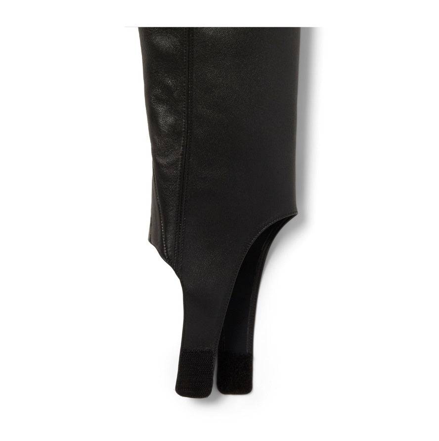 Neil J Rodgers Tik over the knee gaiter designed to be worn with the Tik ankle boot is a stirrup style that attaches over the sole next to the heel. Made of black Italian stretch nappa leather and an elasticized band, the gaiter fits over the knee.