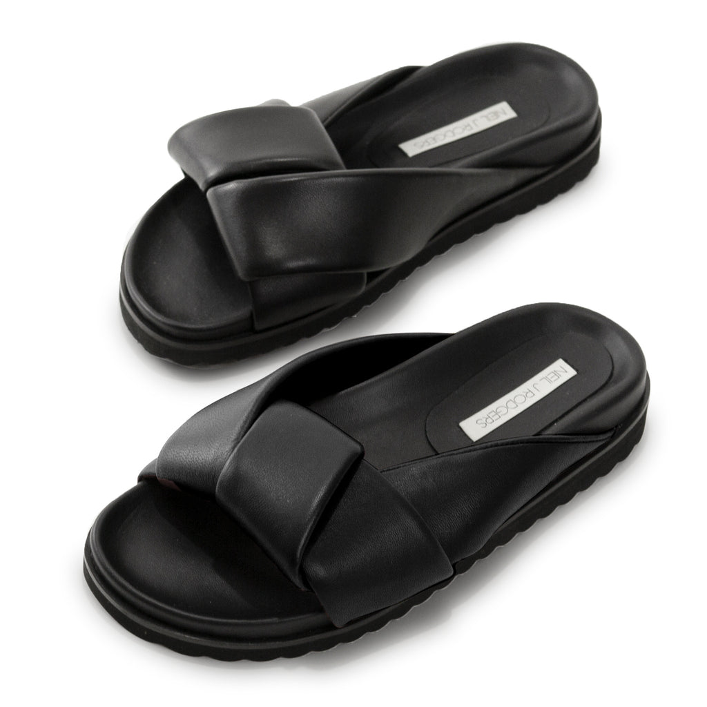 Neil J Rodgers black Obi slide sandal with padded leather straps, comfortable flat footbed and lightweight thick black sole.