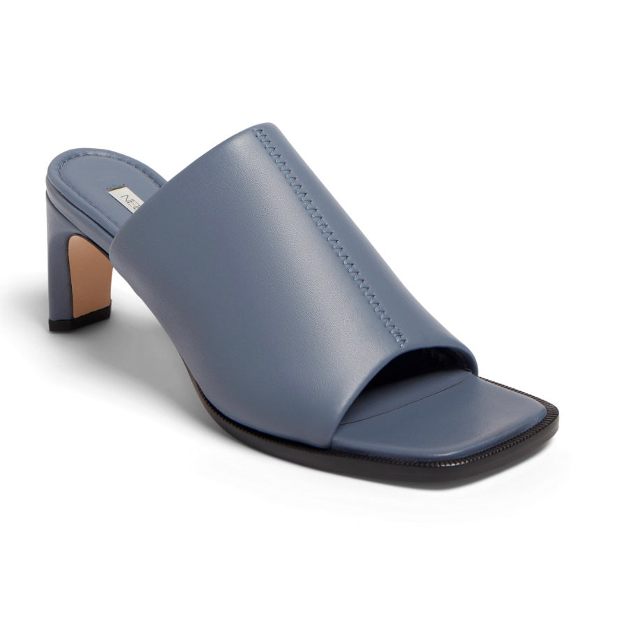 Neil J Rodgers Sue Mule in blue nappa leather has an exaggerated square toe, wide stretch nappa instep strap, padded footbed, and 60mm heel.