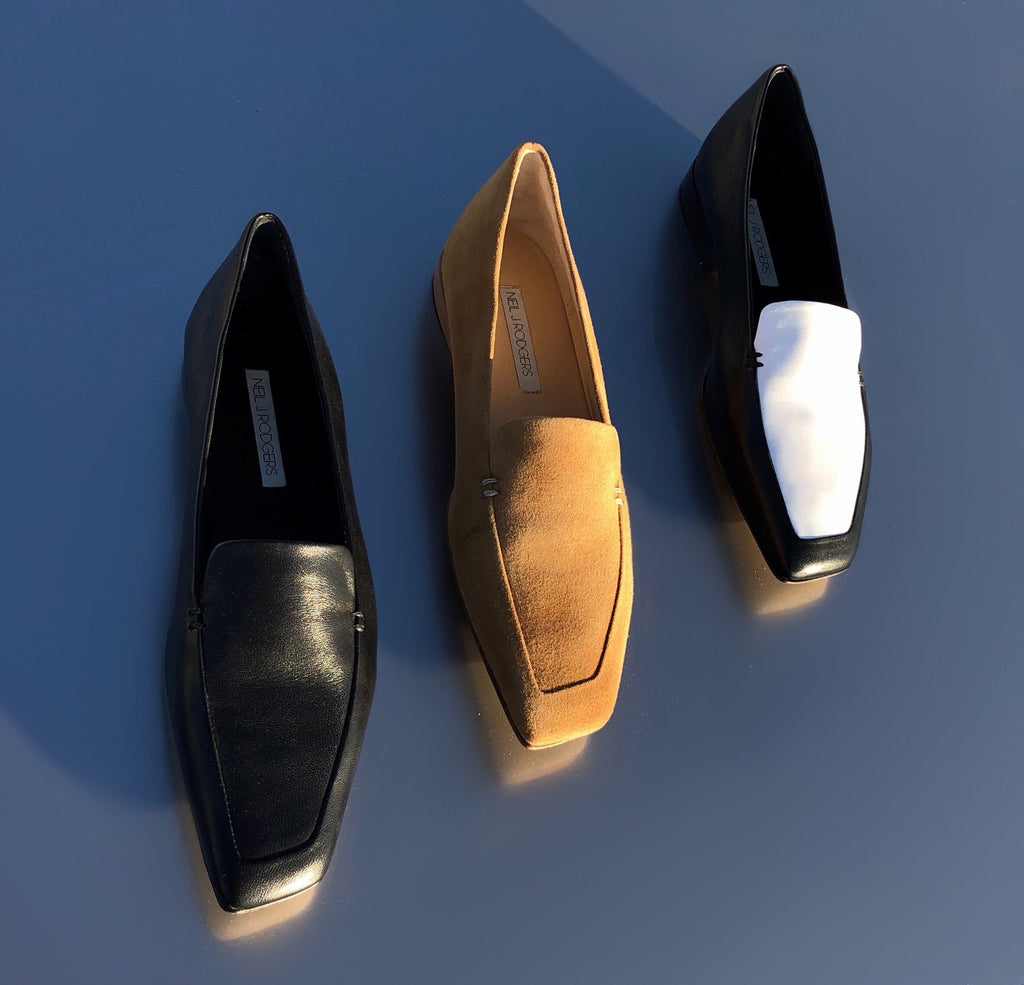 Neil J Rodgers Liscia loafer with a pointed square toe and minimal stitching available in black Italian nappa leather, camel suede, or two tone black and white nappa leather.