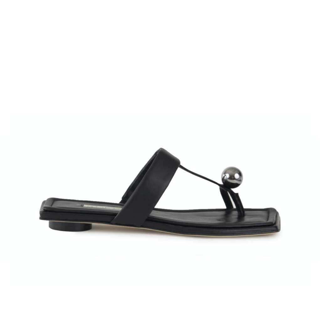 Neil J Rodgers black Samira sandal with a flat footbed, minimal leather straps and silver bead embellishment
