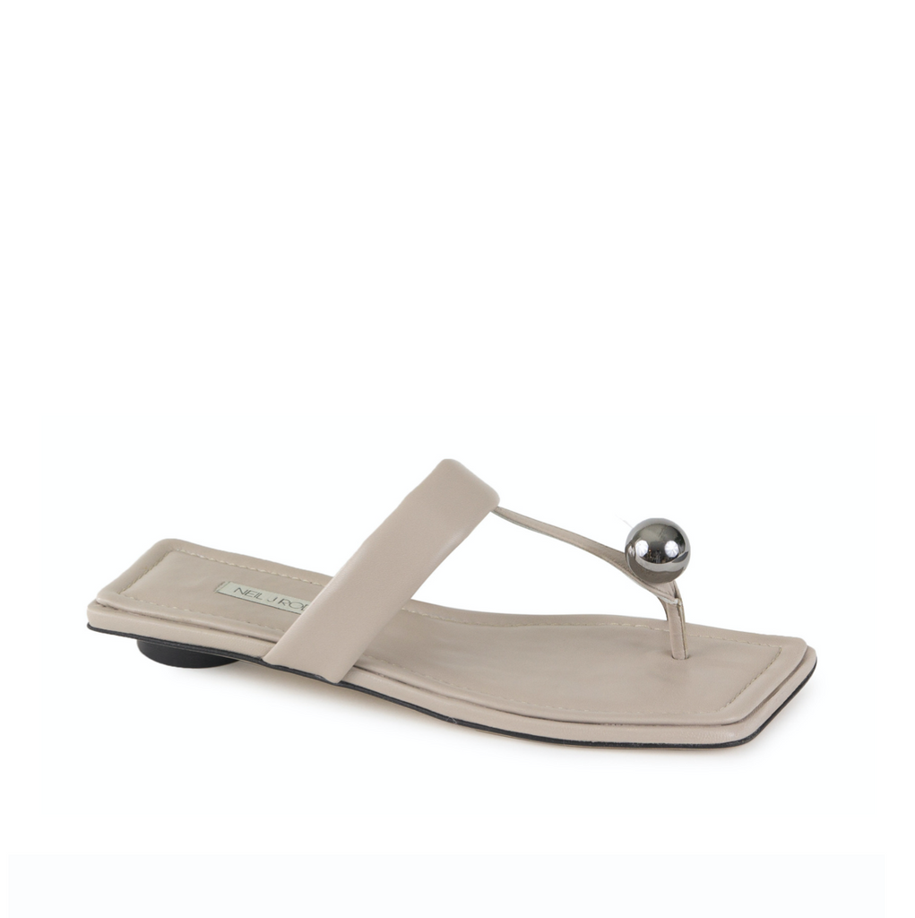 Neil J Rodgers off-white Samira sandal with a flat footbed, minimal leather straps and silver bead embellishment